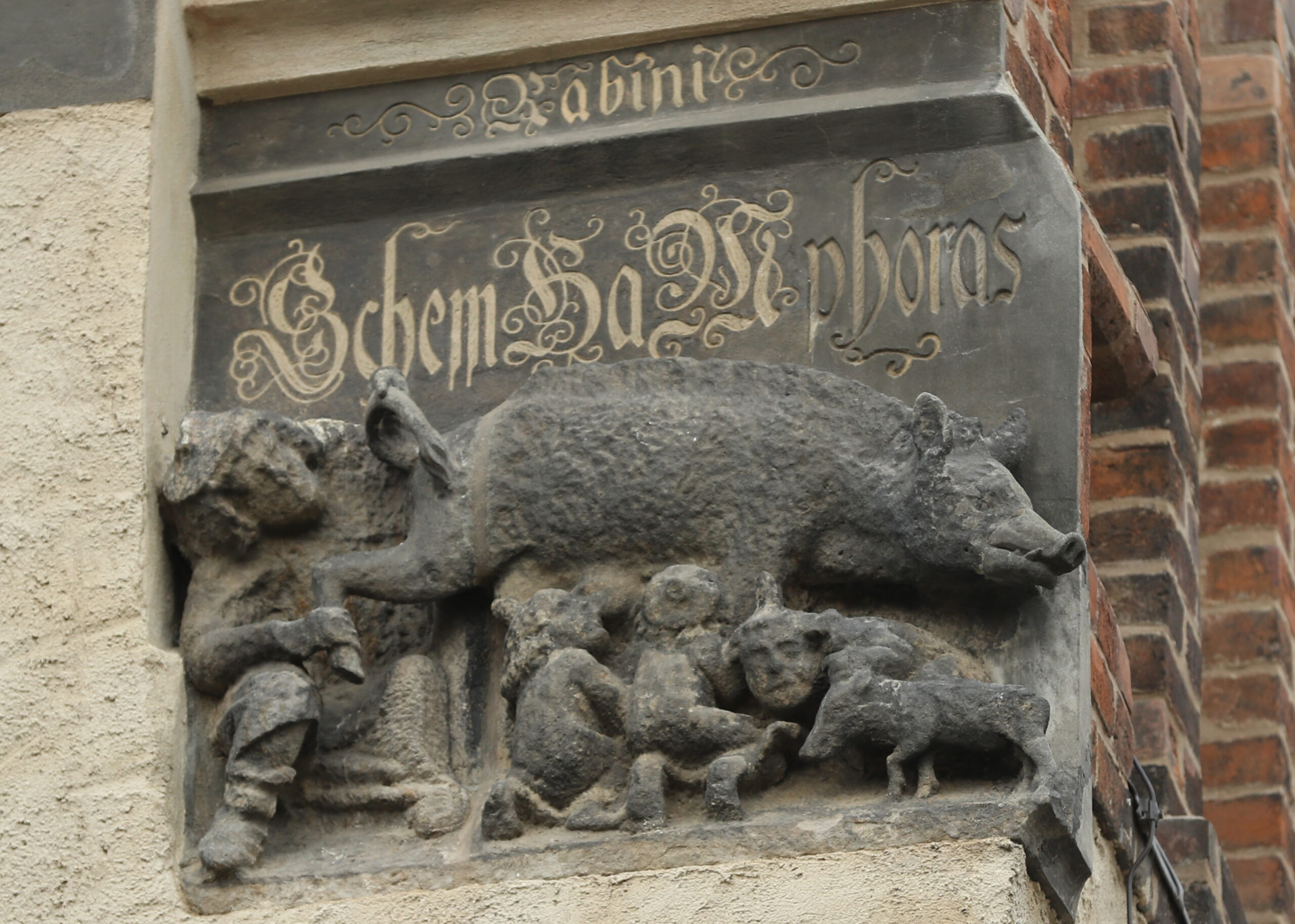 WITTENBERG, GERMANY - OCTOBER 24: A sculpted relief shows the controversial "Judensau," or "Jew's Sow" that shows Jews suckling from the teets of a pig on the facade of the 13th-century Stadtkirche Sankt Marien church where theologian Martin Luther once preached on October 24, 2016 in Wittenberg, Germany. In 1517 Luther nailed his 95 theses to a door of the nearby Schlosskirche Church. Though Luther is celebrated as a hero of Christian religious reform he was outspoken against Jews and called for the destruction of synagogues. Next year will mark the 500th anniversary of the Reformation that Luther set in motion and that led to the creation of successful Protestant movements in history's most significant challenge to the Catholic Church. Celebrations and events in Germany will begin later this month and continue globally through next year. Luther's translation of the Bible made it accessible to a much broader audience. He also spoke out against the practice of indulgences and the sale of relics, and also argued that a place in Heaven is possible not by good deeds but through faith. (Photo by Sean Gallup/Getty Images)